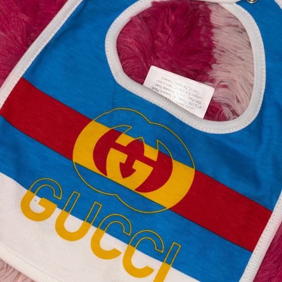 Gucci Kids' White Bib, Onesie And Beanie Set with Blue, Red, and Yellow Accents - Picture 4 of 7